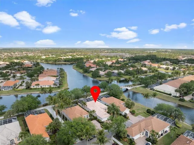 Aerial view featuring a residential view and a water view