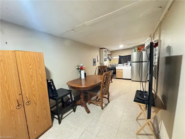 Dining area featuring light flooring