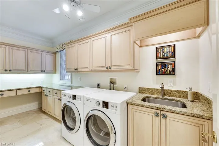 XL Laundry Room w/ Ample Cabinetry & Counter Space