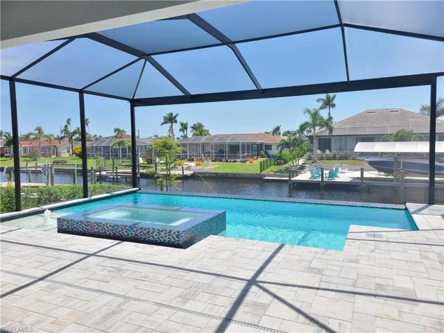 oversized 360 degree overspill spa with sparkling glass tile