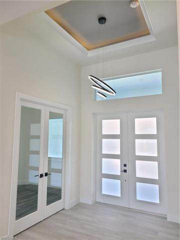 Foyer and frech doors to the study