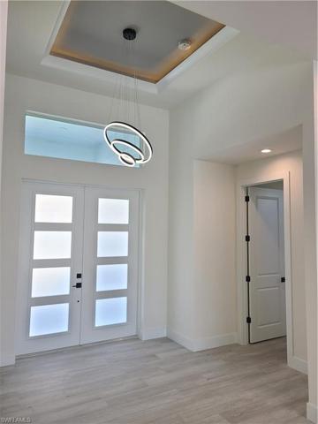 Foyer with entry to master suite