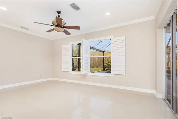Unfurnished room with crown molding, recessed lighting, light tile patterned floors, and a ceiling fan