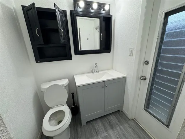 1/2 bath with access to outdoor shower