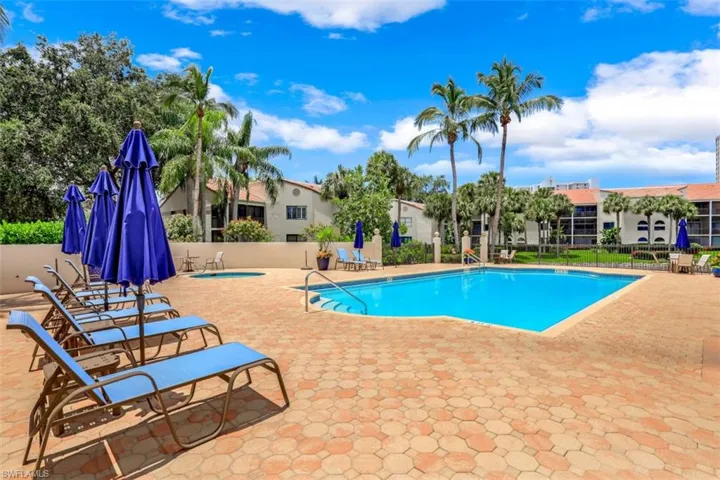 Community pool featuring a patio area