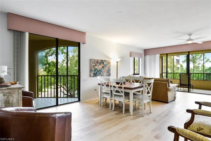 Dining room featuring light wood-style flooring and a ceiling fan