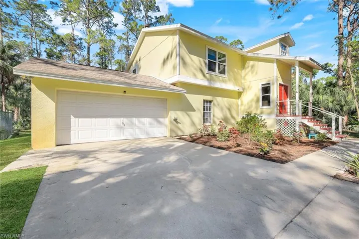 View of front of home with a garage