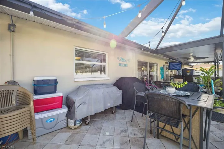 View of patio featuring ceiling fan and outdoor dining space