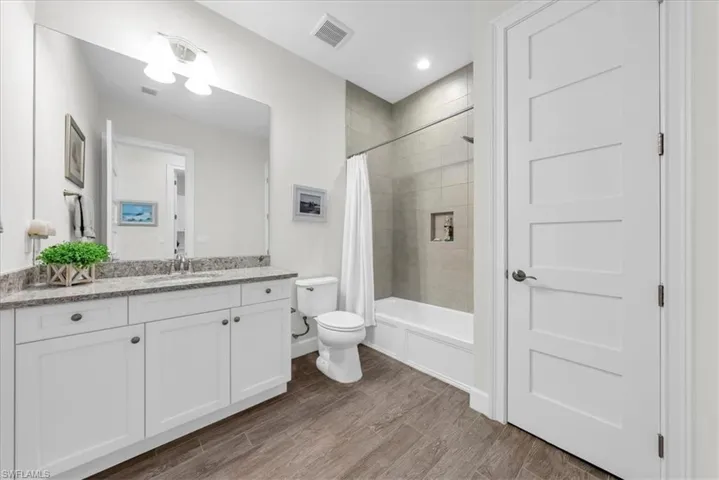Spacious closet featuring wood tiled floors