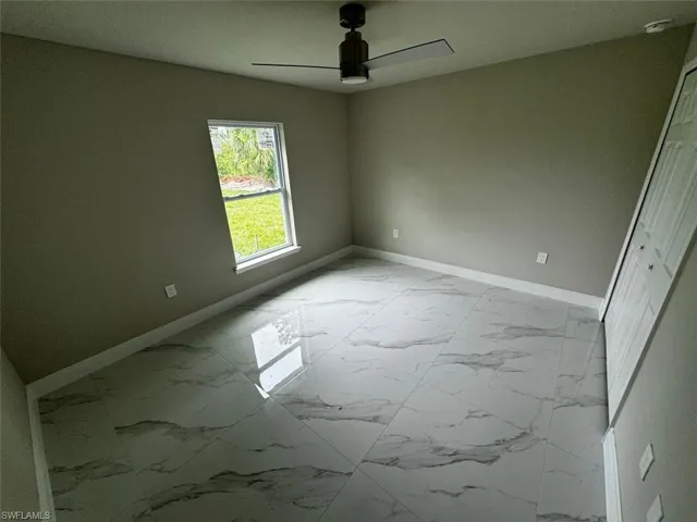 Empty room with ceiling fan