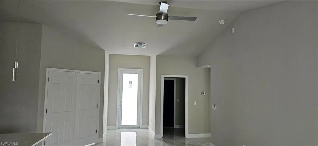 Foyer with ceiling fan