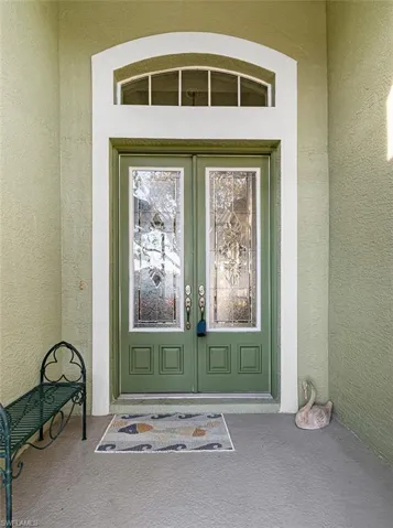 Entrance to property french doors