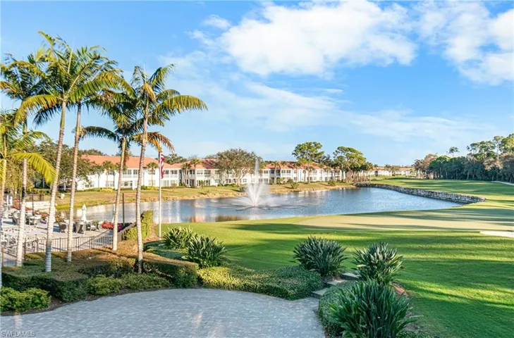 Surrounding community featuring a water view and golf course view