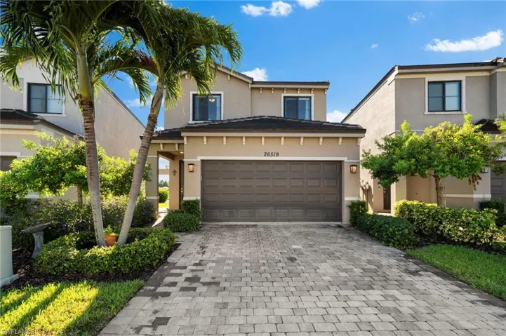 View of front of property featuring a garage