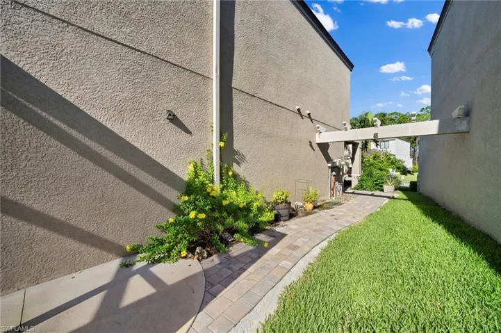 View of home's exterior with a lawn