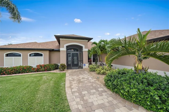 View of front of home with a front lawn