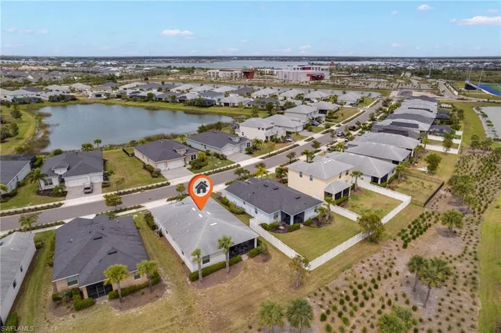 Bird's eye view with a water view and a residential view