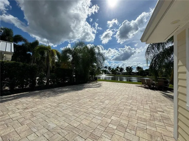 View of patio with a water view