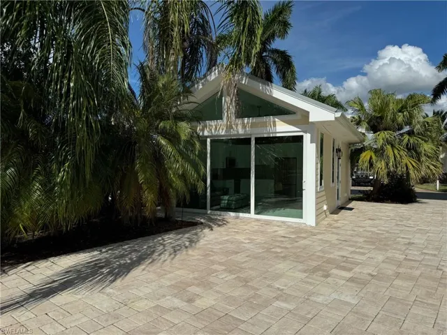 Back of property with a patio