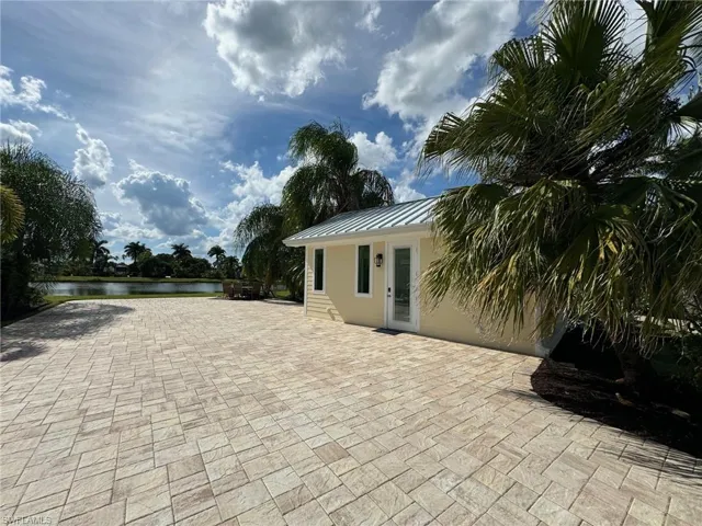 View of patio / terrace featuring a water view