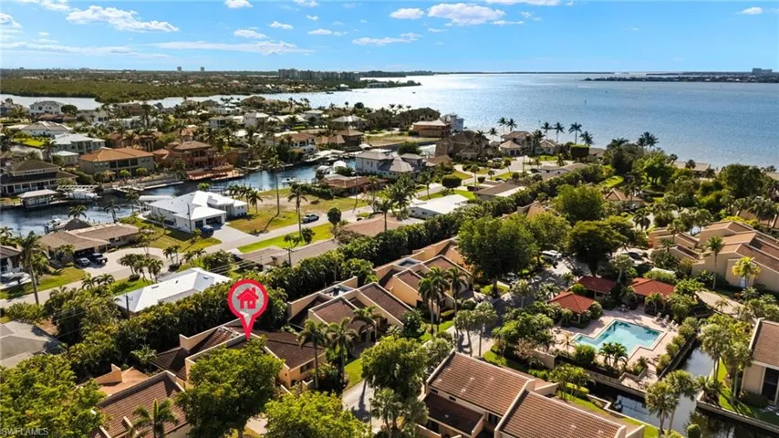 Aerial view with a residential view and a water view