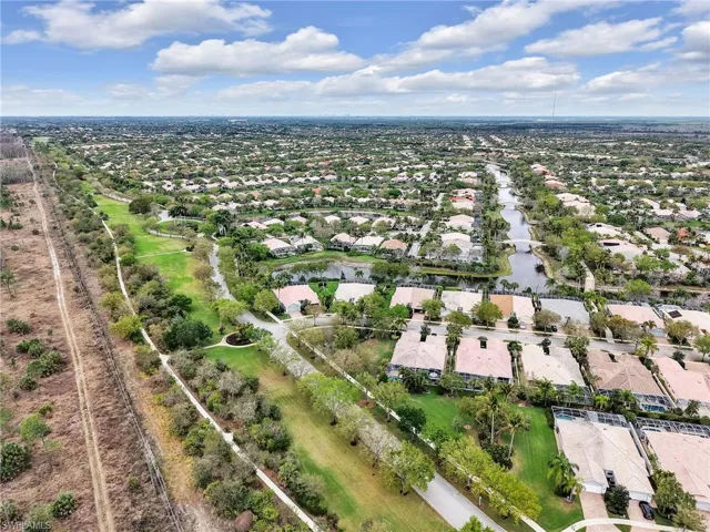 Aerial view of residential area with a large body of water