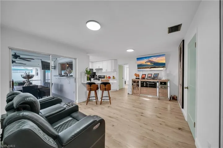 Living room featuring light wood-style floors