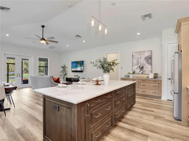 Quartz surfaces, plenty of cabinetry, modern finishes