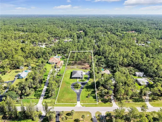 Aerial overview of property's location featuring 2.5 acre homesite