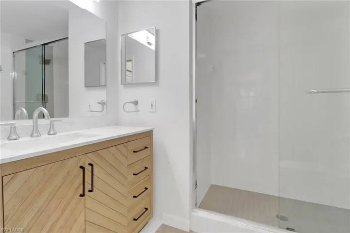 Bathroom with a shower  and vanity