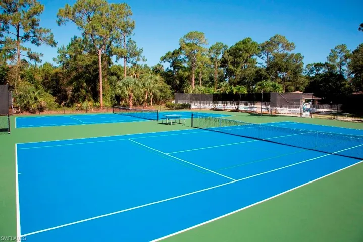 View of tennis court with basketball court