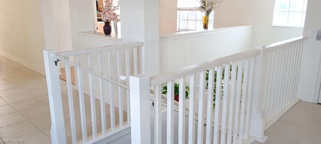 Stairway with tile patterned floors