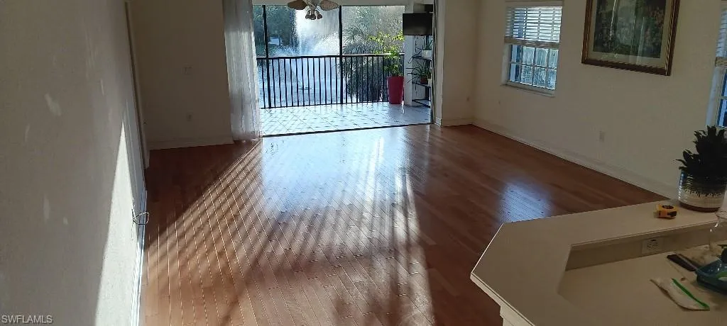 Spare room with hardwood / wood-style floors