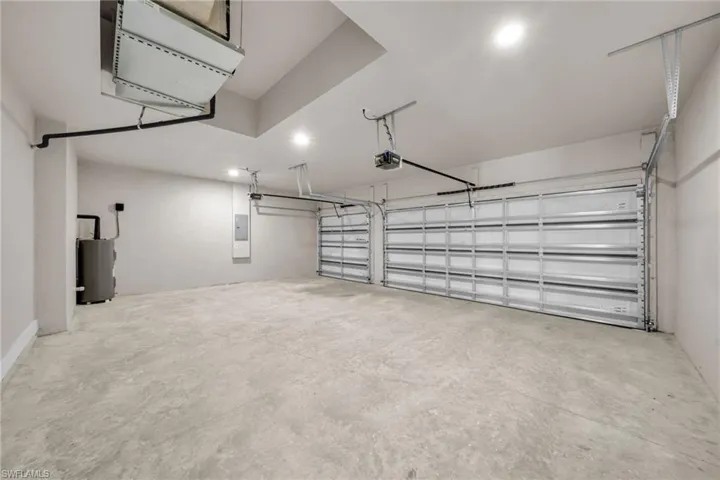 Garage featuring water heater