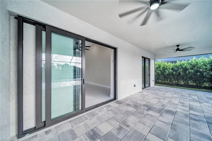 View of patio / terrace with a ceiling fan
