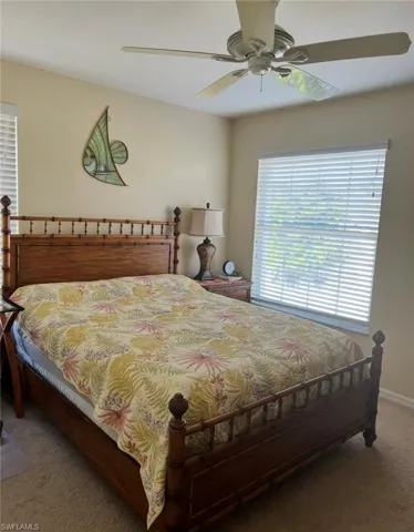 Bedroom featuring carpet and a ceiling fan