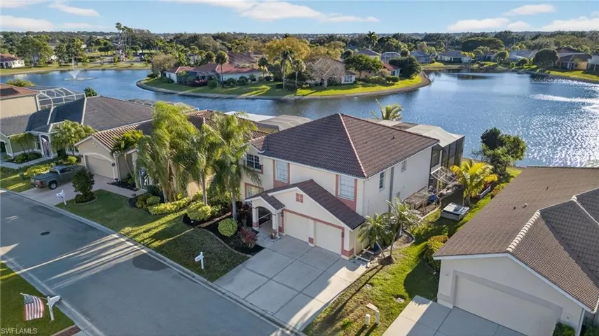 Aerial view of residential area with a large body of water