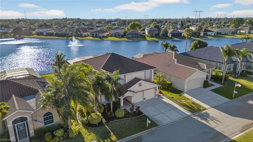 Aerial view of residential area with a large body of water