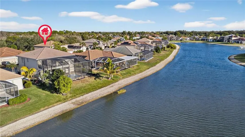 Aerial view of residential area with a nearby body of water