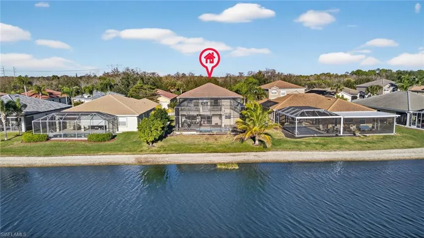 Aerial view of residential area with a nearby body of water