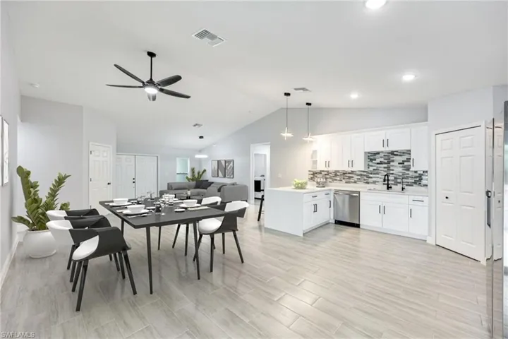Staged- Dinning Room and Living room