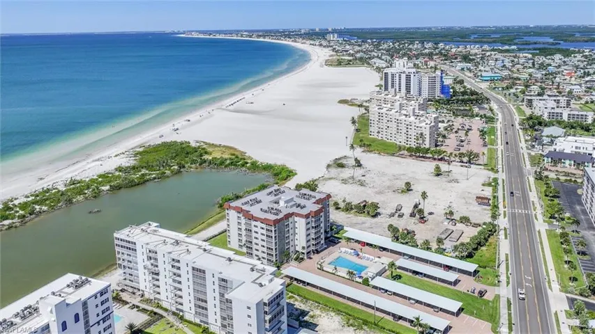 View of urban area with waterfront with a beach