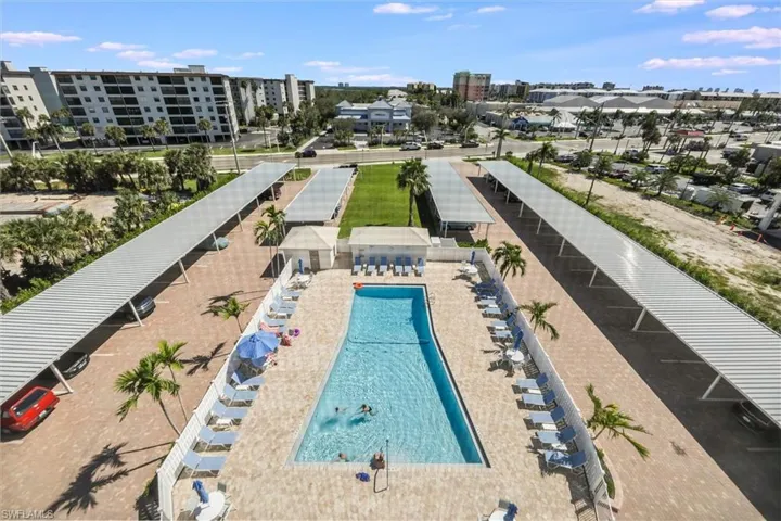 Community pool featuring a patio area