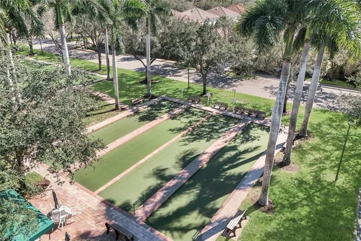 View of property's community with a bocce ball area