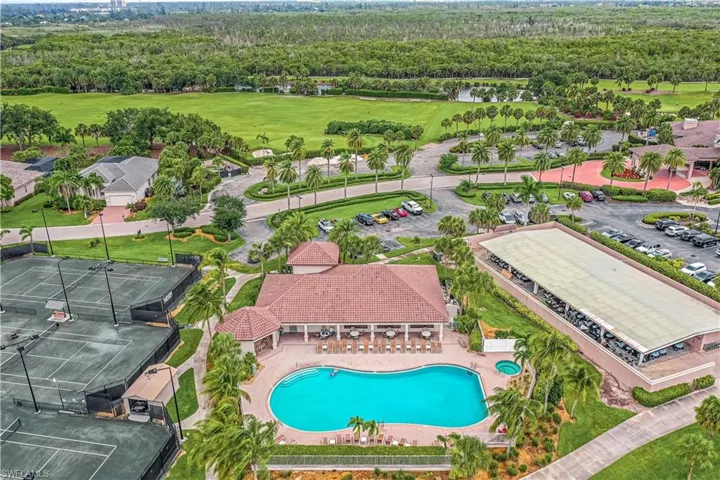 Aerial view of the community pool, fitness center and tennis courts.