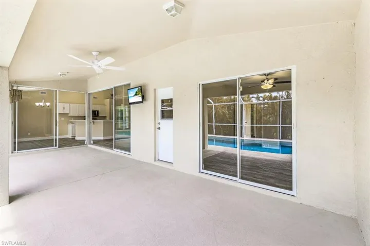 View of patio featuring ceiling fan