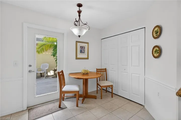 The kitchen has space for a breakfast nook, and has a door to the patio.
