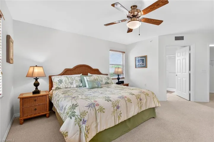 The primary bedroom is plenty big for a king-size bed (shown).