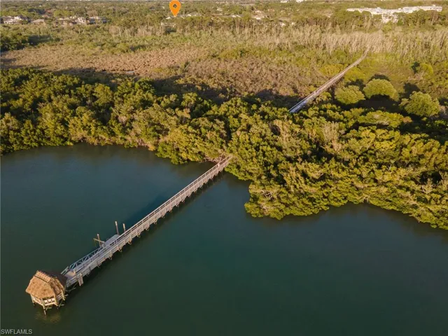 Follow the Bay Forest trail from just behind your lanai out to the boardwalk and tiki in the back bay behind Barefoot Beach!