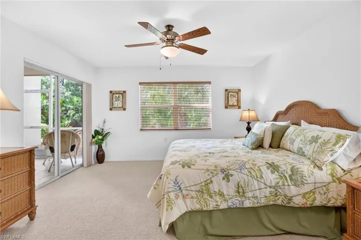 Roomy and bright, and still cozy! The primary bedroom is in the back of the unit, and has direct access to the lanai.